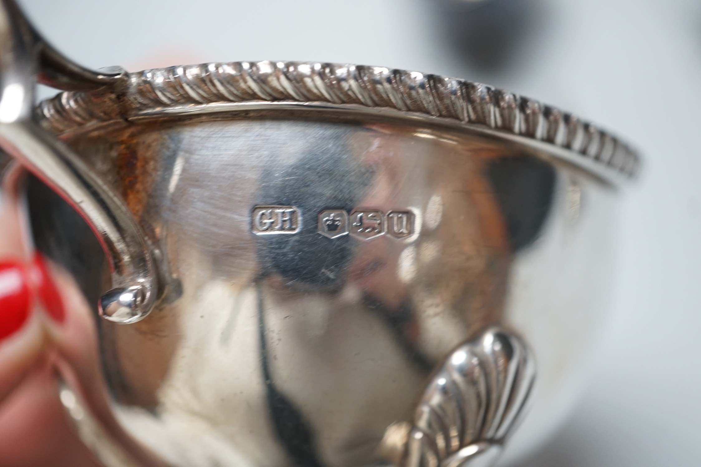 Three assorted 20th century silver sauceboats, longest 14.2cm